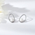 Picture of Latest Small White Stud Earrings