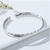Picture of 999 Sterling Silver Platinum Plated Fashion Bangle in Flattering Style