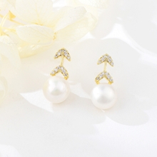 Show details for Irresistible White Zinc Alloy Dangle Earrings As a Gift