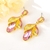 Picture of Classic Flowers & Plants Dangle Earrings at Unbeatable Price