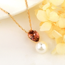 Show details for Filigree Geometric Swarovski Element Pendant Necklace